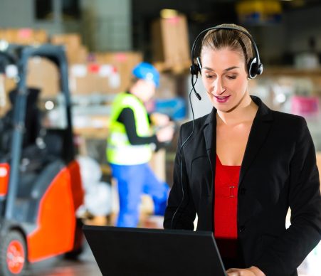 dispatcher using headset at warehouse of forwarding
